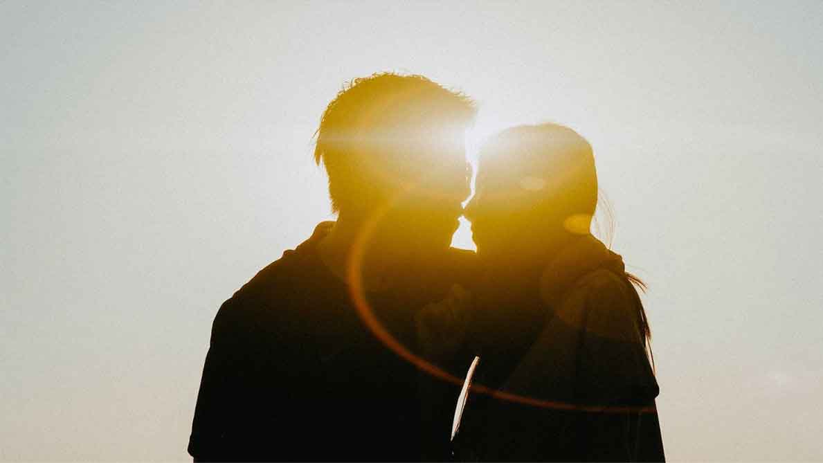 A photo of a silhouette of a man and a woman