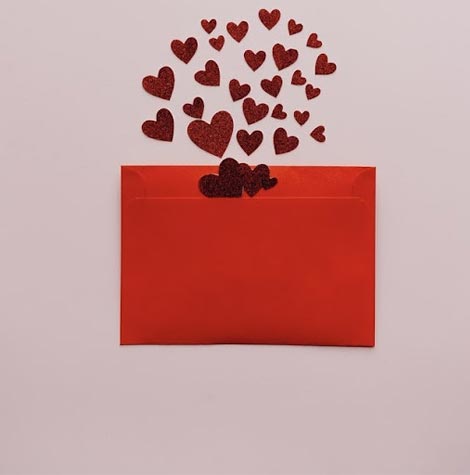 An envelope full of hearts.